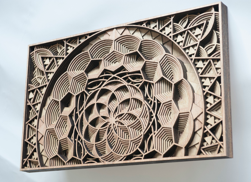 Illustration for article titled Artist Creates Stunning Wooden Sculptures With Laser Cutting Tech